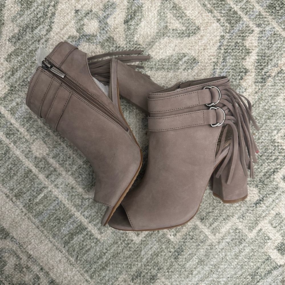 Gray Heeled Boots with Decorative Buckles and Tassels